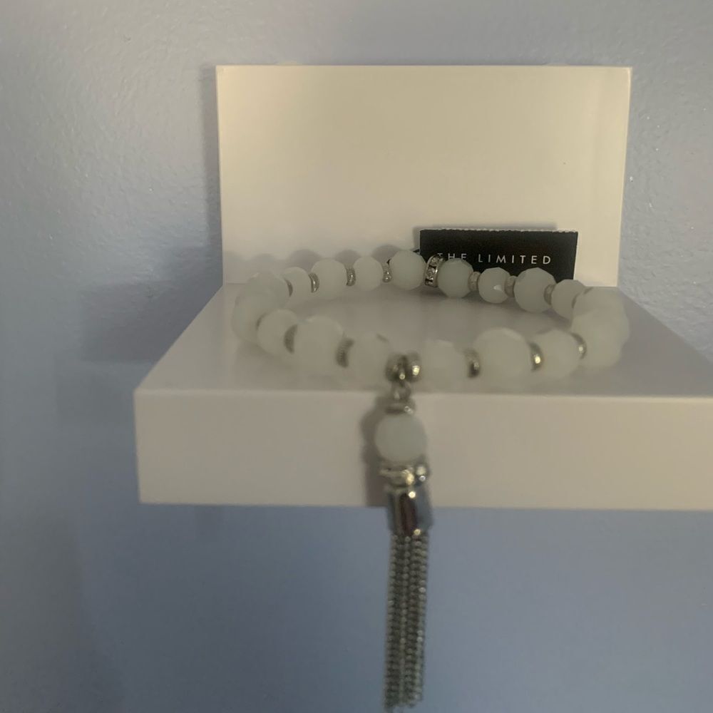 The limited white bracelet silver tassel